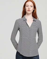 Black, white and striped all over, this wispy silk Theory shirt, is our top pick for elegant-ease this season. Black, white and striped all over, this wispy silk Theory shirt, is our top pick for elegant-ease this season.