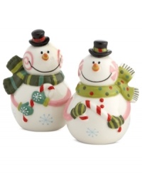 A treat in itself. The whimsical Sweet Twist salt and pepper shakers from Oneida feature snowmen swirling with festive holiday color and clutching sugary treats.