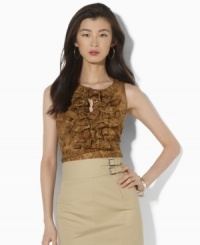 A cascade of ruffles and an eclectic pattern of earth-tone paisley impart easy elegance to Lauren by Ralph Lauren's petite sleeveless blouse in lightweight cotton voile. A cascade of ruffles and an eclectic pattern of earth-tone paisley impart easy elegance to Lauren by Ralph Lauren's petite sleeveless blouse in lightweight cotton voile.