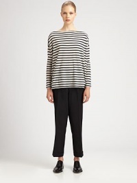 This uniquely structural style features detachable suspenders intended to be worn conventionally or left hanging loose.Detachable suspendersSelf waistband with belt loopsZip fly with tab closureFront pleatsCuffed legBack button welt pocketsPartially attached back seamInseam, about 28PolyesterDry cleanImportedModel shown is 5'9½ (176cm) wearing US size Small. This uniquely structural style features detachable suspenders intended to be worn conventionally or left hanging loose.Detachable suspendersSelf waistband with belt loopsZip fly with tab closureFront pleatsCuffed legBack button welt pocketsPartially attached back seamInseam, about 28PolyesterDry cleanImportedModel shown is 5'9½ (176cm) wearing US size Small.