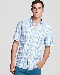 This classic fit Vineyard Vines cotton button-up lends a preppy look in pale-hued plaid. This classic fit Vineyard Vines cotton button-up lends a preppy look in pale-hued plaid.