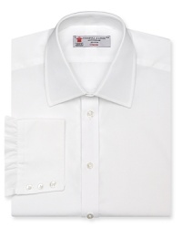 From the premier clothier Turnbull & Asser and rendered in smooth, crisp cotton poplin, this solid dress shirt anchors your attire in classic luxury. From the premier clothier Turnbull & Asser and rendered in smooth, crisp cotton poplin, this solid dress shirt anchors your attire in classic luxury.