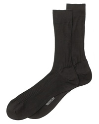 Turnbull & Asser maintains its focus on quality craftsmanship and luxury even on everyday essentials like fine dress socks in soft, breathable cotton. Turnbull & Asser maintains its focus on quality craftsmanship and luxury even on everyday essentials like fine dress socks in soft, breathable cotton.