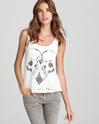 Romantic lace makes a juxtaposing backdrop for a punk-perfect skull graphic (in the shape of a heart, no less) on this Lauren Moshi tank. Romantic lace makes a juxtaposing backdrop for a punk-perfect skull graphic (in the shape of a heart, no less) on this Lauren Moshi tank.