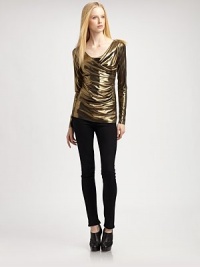 Shimmer away in this fitted metallic top with long sleeves and an asymmetrical cowlneck. Asymmetrical cowlneckLong sleeves95% polyester/5% spandexDry cleanMade in USA of imported fabricModel shown is 5'9½ (176cm) wearing US size Small. Shimmer away in this fitted metallic top with long sleeves and an asymmetrical cowlneck. Asymmetrical cowlneckLong sleeves95% polyester/5% spandexDry cleanMade in USA of imported fabricModel shown is 5'9½ (176cm) wearing US size Small.