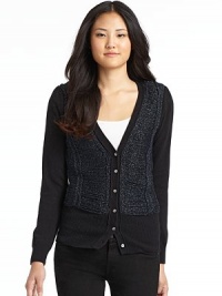 THE LOOKDeep v-neckSix-button closureLong sleeves with fitted ribbed cuffsFringe front detailFitted ribbed hemTHE FITAbout 33 from shoulder to hemTHE MATERIAL43% rayon/42% nylon/7% wool/5% angora/3% cashmereFringe: 90% cotton/10% metallicCARE & ORIGINDry cleanImported THE LOOKDeep v-neckSix-button closureLong sleeves with fitted ribbed cuffsFringe front detailFitted ribbed hemTHE FITAbout 33 from shoulder to hemTHE MATERIAL43% rayon/42% nylon/7% wool/5% angora/3% cashmereFringe: 90% cotton/10% metallicCARE & ORIGINDry cleanImported