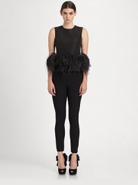 Supple silk, tailored in a form-fitting shell silhouette and generously trimmed with luxe ostrich feathers.Jewel necklineSleevelessBust dartsOstrich feather trimConcealed back zipSilkDry cleanMade in Italy of imported fabricModel shown is 5'8½ (174cm) wearing US size 4. 
