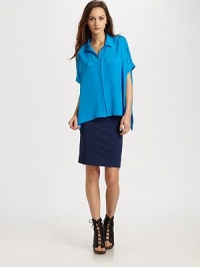 Effortlessly chic in woven silk, tailored with menswear details in a flowy trapeze silhouette.Point collarExtended epaulettesConcealed placketShort sleevesAbout 25 from shoulder to hemSilkDry cleanImportedModel shown is 5'10 (178cm) wearing US size Small.OUR FIT MODEL RECOMMENDS ordering true size. Effortlessly chic in woven silk, tailored with menswear details in a flowy trapeze silhouette.Point collarExtended epaulettesConcealed placketShort sleevesAbout 25 from shoulder to hemSilkDry cleanImportedModel shown is 5'10 (178cm) wearing US size Small.OUR FIT MODEL RECOMMENDS ordering true size.