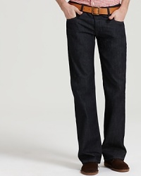 Diesel slim bootcut jeans with five pocket styling and button fly. 12.5 oz denim. In an ultra dark wash, an almost raw look. Diesel slim bootcut jeans with five pocket styling and button fly. 12.5 oz denim. In an ultra dark wash, an almost raw look.
