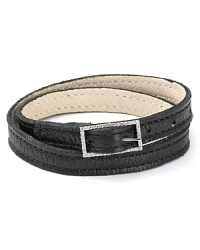 Rich Italian leather crafts a sophisticated statement on this Crislu wrap bracelet, finished by a glamorous cubic zirconia adorned buckle. Rich Italian leather crafts a sophisticated statement on this Crislu wrap bracelet, finished by a glamorous cubic zirconia adorned buckle.