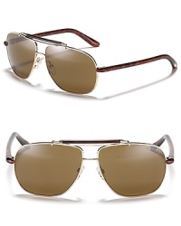 Tom Ford's new take on the iconic aviator featuring a statement-making double bar design. Tom Ford's new take on the iconic aviator featuring a statement-making double bar design.