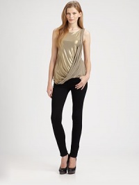Add a shot of shimmer to any ensemble with this on-trend tank, enhanced by an asymmetrically draped front panel and glimmering goldtone finish. RoundneckSleevelessAsymmetrically draped front panelBody: 95% polyester/5% spandexTrim: 94% rayon/6% spandexDry cleanMade in USAModel shown is 5'10 (177cm) wearing US size Small.This style runs small. We recommend ordering one size up for a standard fit. Add a shot of shimmer to any ensemble with this on-trend tank, enhanced by an asymmetrically draped front panel and glimmering goldtone finish. RoundneckSleevelessAsymmetrically draped front panelBody: 95% polyester/5% spandexTrim: 94% rayon/6% spandexDry cleanMade in USAModel shown is 5'10 (177cm) wearing US size Small.This style runs small. We recommend ordering one size up for a standard fit.