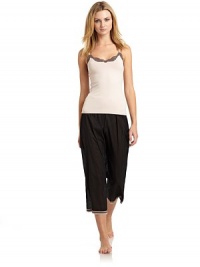 THE LOOKSemi-sheer designThin elastic waistCropped wide leg silhouette Lace-trimmed hem THE FITRise, about 11Inseam, about 23THE MATERIALCottonCARE & ORIGINHand washMade in USAModel shown is 5'10 (177cm) wearing US size Small. THE LOOKSemi-sheer designThin elastic waistCropped wide leg silhouette Lace-trimmed hem THE FITRise, about 11Inseam, about 23THE MATERIALCottonCARE & ORIGINHand washMade in USAModel shown is 5'10 (177cm) wearing US size Small.