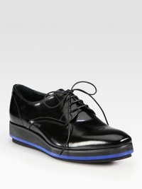 Lace-up oxford design with a micro-platform. Micro-foam wedge, 1½ (40mm)Micro-foam-insert platform, ¾ (20mm)Compares to a ¾ heel (20mm)Leather upperLeather liningRubber solePadded insoleMade in Italy Lace-up oxford design with a micro-platform. Micro-foam wedge, 1½ (40mm)Micro-foam-insert platform, ¾ (20mm)Compares to a ¾ heel (20mm)Leather upperLeather liningRubber solePadded insoleMade in Italy