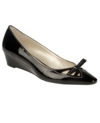 Elegance made easy. The Yaffa pumps by Etienne Aigner are a workday winner with their sophisticated detailing and low wedge heel. Elegance made easy. The Yaffa pumps by Etienne Aigner are a workday winner with their sophisticated detailing and low wedge heel.