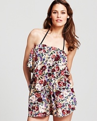 Zimmermann's floral print romper is a powerful post plunge statement. Cut from lightweight silk, it's easy on the beach and off.