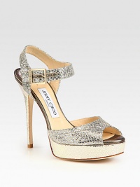 Snake-embossed platform silhouette is upgraded with sparkling glitter-coated leather and a towering heel. Snake-embossed metallic leather heel, 5 (125mm)Snake-embossed metallic leather-covered platform, 1 (25mm)Compares to a 4 heel (100mm)Glitter-coated leather upperAdjustable ankle strapLeather lining and solePadded insoleMade in Italy Snake-embossed platform silhouette is upgraded with sparkling glitter-coated leather and a towering heel. Snake-embossed metallic leather heel, 5 (125mm)Snake-embossed metallic leather-covered platform, 1 (25mm)Compares to a 4 heel (100mm)Glitter-coated leather upperAdjustable ankle strapLeather lining and solePadded insoleMade in Italy