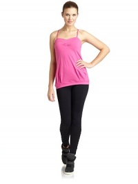 THE LOOKSweetheart necklineAdjustable strapsRuched bustBuilt-in self braPleated banded hemCross-back strapsTHE FITAbout 24 from shoulder to hemTHE MATERIALNylon/spandexCARE & ORIGINMachine washImportedModel shown is 5'9 (175cm) wearing US size Small. THE LOOKSweetheart necklineAdjustable strapsRuched bustBuilt-in self braPleated banded hemCross-back strapsTHE FITAbout 24 from shoulder to hemTHE MATERIALNylon/spandexCARE & ORIGINMachine washImportedModel shown is 5'9 (175cm) wearing US size Small.