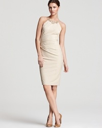 A sparkling, embellished neckline lends opulence to this David Meister dress, tailored with side ruching for an impeccable fit. A sparkling, embellished neckline lends opulence to this David Meister dress, tailored with side ruching for an impeccable fit.