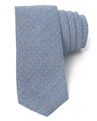 The Loughton Roadster tie combines a slanting textured pindot pattern and a skinny shape for a look that's as slick at the office as it is at the office party. The Loughton Roadster tie combines a slanting textured pindot pattern and a skinny shape for a look that's as slick at the office as it is at the office party.