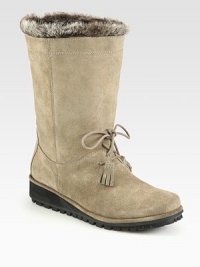 Water-resistant sport suede braves the elements and is enhanced with a faux fur lining for warmth.Shaft, 9Front tie detailFaux fur liningPadded insoleRubber soleMade in SpainAdditional InformationShipping timeline for this item Women's Shoe Size Guide (International Equivalents) This item cannot be shipped via Rush, Next Business Day, Saturday delivery.This item cannot be shipped to a P.O. Box, APO/FPO or U.S. Territory. Water-resistant sport suede braves the elements and is enhanced with a faux fur lining for warmth.Shaft, 9Front tie detailFaux fur liningPadded insoleRubber soleMade in SpainAdditional InformationShipping timeline for this item Women's Shoe Size Guide (International Equivalents) This item cannot be shipped via Rush, Next Business Day, Saturday delivery.This item cannot be shipped to a P.O. Box, APO/FPO or U.S. Territory.