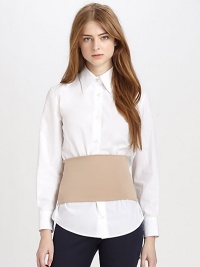 Trompe l'oeil in its truest form, this lengthy poplin shirt visually slims the waist. Point collarButton frontLong sleeves with buttoned cuffsContoured hem hits below the hipsAbout 18 from shoulder to hemCottonDry cleanImportedModel shown is 5'10 (177cm) wearing US size 4. Trompe l'oeil in its truest form, this lengthy poplin shirt visually slims the waist. Point collarButton frontLong sleeves with buttoned cuffsContoured hem hits below the hipsAbout 18 from shoulder to hemCottonDry cleanImportedModel shown is 5'10 (177cm) wearing US size 4.