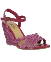 Ravishing and refined. The raffia fabric on the upper of Mia's Poem wedge sandals give the sandals a fresh look. Ravishing and refined. The raffia fabric on the upper of Mia's Poem wedge sandals give the sandals a fresh look.