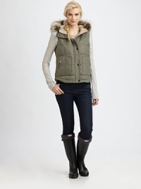 Inspired by vintage styling, a quilted wool vest with a natural fox fur-trimmed hood and convenient pockets. Fur-trimmed hoodConcealed front zipperSnap button closureKangaroo pocketsFully linedAbout 23 from shoulder to hemBody: woolFill: 80% down feathers/20% waterfowl feathersDry clean by fur specialistImportedFur origin: China Model shown is 5'10½ (179cm) wearing US size Small. Inspired by vintage styling, a quilted wool vest with a natural fox fur-trimmed hood and convenient pockets. Fur-trimmed hoodConcealed front zipperSnap button closureKangaroo pocketsFully linedAbout 23 from shoulder to hemBody: woolFill: 80% down feathers/20% waterfowl feathersDry clean by fur specialistImportedFur origin: China Model shown is 5'10½ (179cm) wearing US size Small.