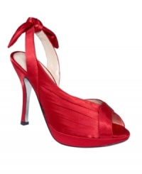 Satin with a d'orsay cut. E! Live From The Red Carpet's E0006 evening platform pumps feature bow detail on the sling-back strap. Satin with a d'orsay cut. E! Live From The Red Carpet's E0006 evening platform pumps feature bow detail on the sling-back strap.