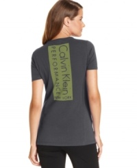 Be sporty-chic in Calvin Klein Performance's logo tee, made from a comfy quick-drying fabric blend. Be sporty-chic in Calvin Klein Performance's logo tee, made from a comfy quick-drying fabric blend.