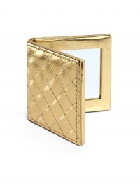 Gold fold up mirror with Saks name plate on outside of the mirror. About 6.5 X 8.5. Gold fold up mirror with Saks name plate on outside of the mirror. About 6.5 X 8.5.