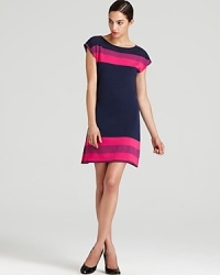 Crisp color blocking defines the boxy silhouette of this Lilly Pulitzer dress for an effortlessly chic approach to everyday style. Crisp color blocking defines the boxy silhouette of this Lilly Pulitzer dress for an effortlessly chic approach to everyday style.