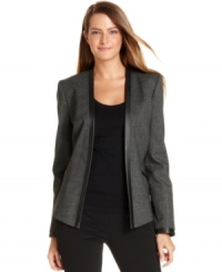 Calvin Klein's latest blazer features a minimalist aesthetic while still looking luxe, thanks to sleek styling and faux leather trim. Calvin Klein's latest blazer features a minimalist aesthetic while still looking luxe, thanks to sleek styling and faux leather trim.