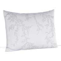 Delicate floral vines wind across solid cotton jacquard on duvets and shams in this luxe collection by Vera Wang.
