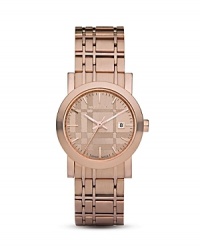 Adorn your wrist with this gorgeous, gleaming rose gold tone watch from Burberry. A subtle, signature check design lends added dimension to the dial. Adorn your wrist with this gorgeous, gleaming rose gold tone watch from Burberry. A subtle, signature check design lends added dimension to the dial.