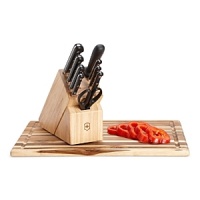 Handcrafted in Soligin, Germany, the knives in this 8-piece set are hot dropped forged from a single piece of high-carbon stainless steel and ice tempered for optimum sharpness and edge retention. Perfect tools for the kitchen that will last a lifetime. Handcrafted in Soligin, Germany, the knives in this 8-piece set are hot dropped forged from a single piece of high-carbon stainless steel and ice tempered for optimum sharpness and edge retention. Perfect tools for the kitchen that will last a lifetime.