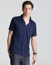 Crafted in a classic color that goes with everything, this 7 For All Mankind polo is a versatile must. Crafted in a classic color that goes with everything, this 7 For All Mankind polo is a versatile must.