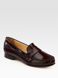 Slip on this preppy favorite rendered in fine leather with a hint of sheen. Leather upperLeather liningLeather and rubber solePadded insoleImported Slip on this preppy favorite rendered in fine leather with a hint of sheen. Leather upperLeather liningLeather and rubber solePadded insoleImported