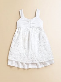 A classic, beautiful frock rendered in pure cotton with an angelic eyelet overlay for the perfect seasonal ensemble.Sweetheart necklineSleevelessBack buttonsEmpire waistFull skirt with eyelet overlayCottonMachine washMade in USA Please note: Number of buttons may vary depending on size ordered. A classic, beautiful frock rendered in pure cotton with an angelic eyelet overlay for the perfect seasonal ensemble.Sweetheart necklineSleevelessBack buttonsEmpire waistFull skirt with eyelet overlayCottonMachine washMade in USA Please note: Number of buttons may vary depending on size ordered.