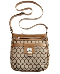 Make a move toward contemporary cool with this irresistible crossbody from Nine West. Jacquard signature print, complementary trim and signature hardware add depth and dimension, while the surprisingly spacious interior stashes your everyday essentials with ease.
