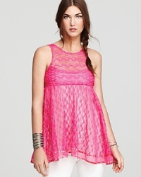 Work an ultra-feminine silhouette in this hotly hued Free People babydoll top, fashioned in delicate lace. Work an ultra-feminine silhouette in this hotly hued Free People babydoll top, fashioned in delicate lace.