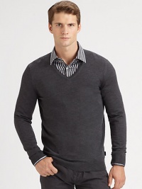 Slim-fit extra-fine merino wool sweater with contrast color detail at inside collar trim.V-neckRibbed knit cuffs and hemWoolDry cleanImported Slim-fit extra-fine merino wool sweater with contrast color detail at inside collar trim.V-neckRibbed knit cuffs and hemWoolDry cleanImported