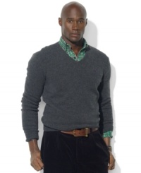 A classic V-neck sweater is crafted from luxe Italian wool, making it the perfect preppy layering piece as the temperature begins to cool. A classic V-neck sweater is crafted from luxe Italian wool, making it the perfect preppy layering piece as the temperature begins to cool.