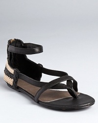 A woven, striped pattern at the heel takes these Joie sandals from essential basic to must-have chic. A woven, striped pattern at the heel takes these Joie sandals from essential basic to must-have chic.