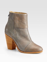 Glimmering leather style with a chunky heel, back zipper and unique fold-over detail. Stacked heel, 3½ (90mm)Leather upperBack zipperLeather lining and solePadded insoleImportedOUR FIT MODEL RECOMMENDS ordering true whole size; ½ sizes should order the next whole size up. Glimmering leather style with a chunky heel, back zipper and unique fold-over detail. Stacked heel, 3½ (90mm)Leather upperBack zipperLeather lining and solePadded insoleImportedOUR FIT MODEL RECOMMENDS ordering true whole size; ½ sizes should order the next whole size up.
