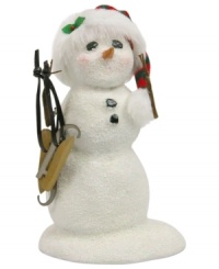 A snowman taking the ice in stride, this Byers' Choice figurine carries a new pair of skates over her arm and wears a striped hat that's perfect for the season. A snowman taking the ice in stride, this Byers' Choice figurine carries a new pair of skates over her arm and wears a striped hat that's perfect for the season.