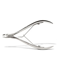 TOOLS OF THE TRADEHigh-performance Cuticle Nipper and dual-ended Cuticle PusherMaintain impeccably manicured cuticles with this must-have pair of precision grooming implements, exclusively designed by nail expert and go-to manicurist for the fashion elite, Deborah Lippmann. Set contains:CUTICLE PUSHERThis professional-grade, stainless steel pusher is dual-ended for precision cuticle care. For best results, first apply Deborah Lippmann Cuticle Remover (sold separately) to soften cuticles. Then, using the arched end, gently ease cuticles back toward the knuckle. The opposite tip of the pusher helps target more stubborn cuticle build-up.CUTICLE NIPPERAfter you properly push back the cuticles, our easy-to-use stainless steel nipper features an ultra-sharp ¼ jaw to expertly trim only any remaining excess, hanging cuticle. Nothing more. The ergonomically designed, double spring-loaded handles are carefully calibrated to provide steady control with either the light or firm tension position.