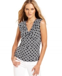 A crisp graphic print offers a perfect complement to the soft drape of this sleeveless top from MICHAEL Michael Kors. Try it with bright white denim for a fresh seasonal look. A crisp graphic print offers a perfect complement to the soft drape of this sleeveless top from MICHAEL Michael Kors. Try it with bright white denim for a fresh seasonal look.