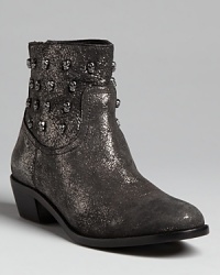 A sparkling finish and gunmetal skull studs give these edgy Zadig & Voltaire booties glam-meets-gothic presence. A sparkling finish and gunmetal skull studs give these edgy Zadig & Voltaire booties glam-meets-gothic presence.