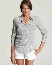 Channel your inner cowgirl and don this floral-print western-style shirt from True Religion. Cute and casual with white denim shorts, the femme off-duty style is perfect for the start of spring before things heat up.